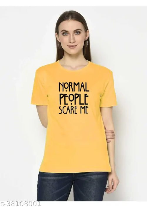 A woman wearing a yellow t-shirt with the text 'NORMAL PEOPLE SCARE ME' printed in black.
